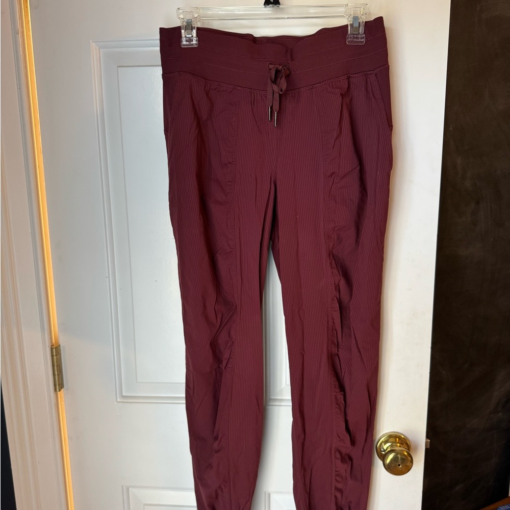 Lululemon Athletica Red Track Pants with Tapered Leg and Drawstring Waist
